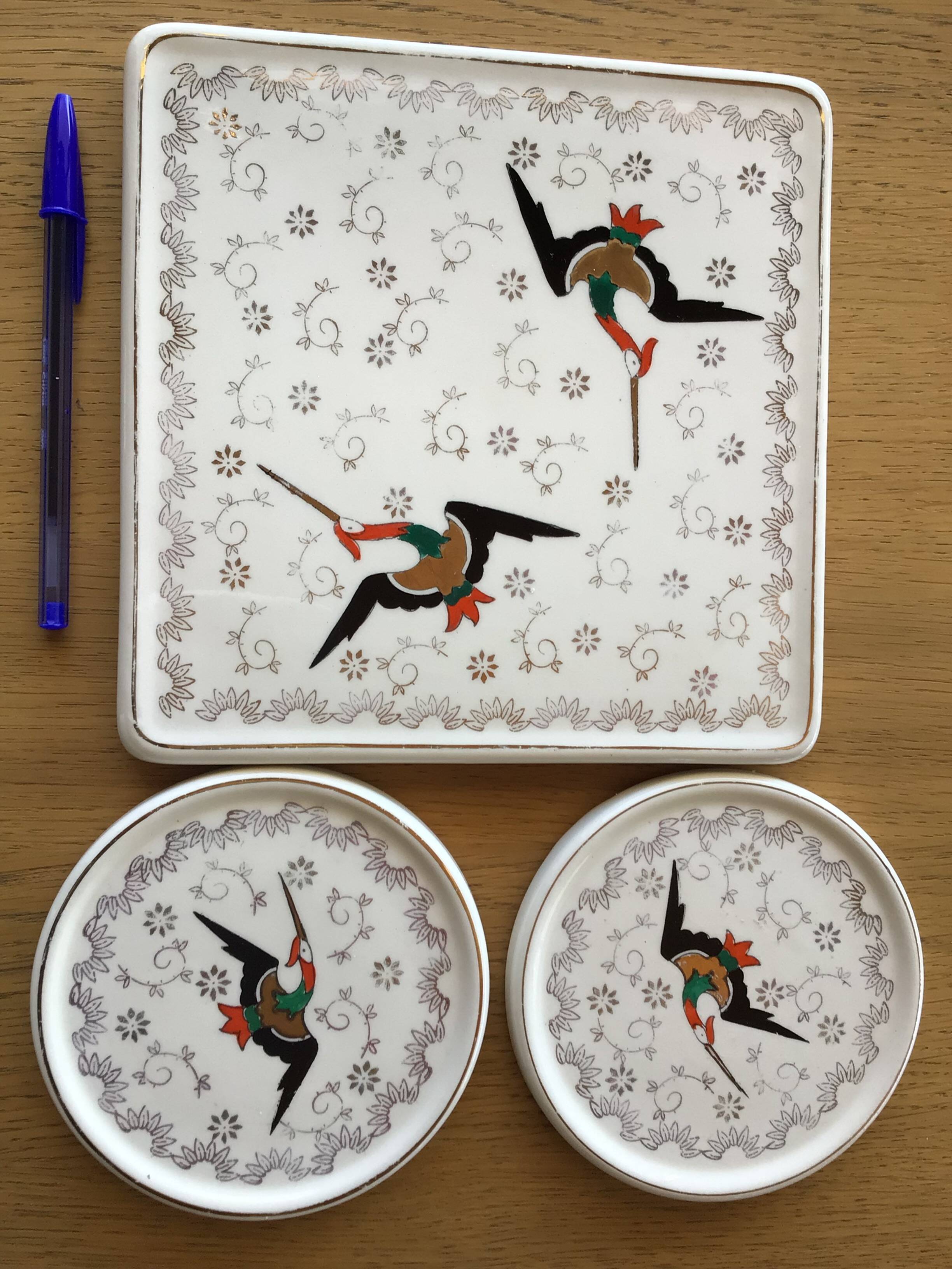 Longwy Chypre cream trivets and bottles