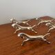 Set of 6 vintage galloping horse knife rests in silver-plated metal.