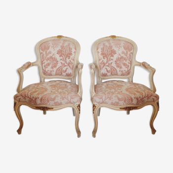 Two Louis XV style convertible armchairs