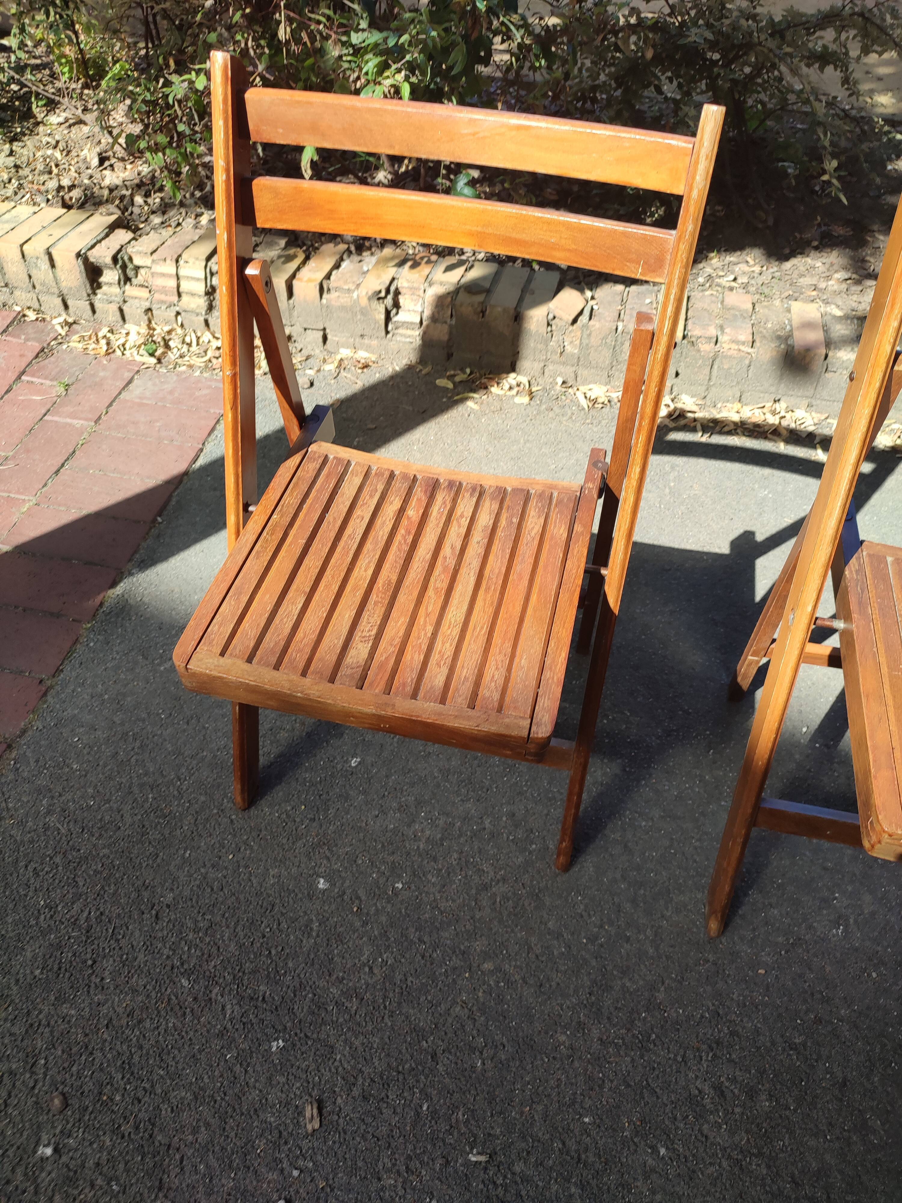 4 folding teak chairs