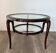 Round mid-century coffee table in walnut with a double top by Paolo Buffa.