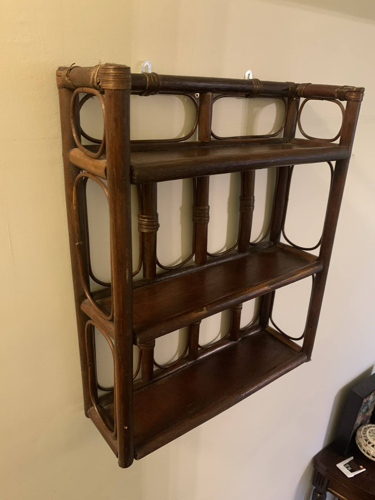 Rattan wall shelf