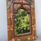 Petit miroir en bois ancien sculpté de fleurs 36x25