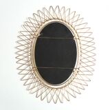 Oval golden metal sun mirror, 60s