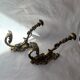Gilded bronze hook nineteenth, Louis XVI, chimera decoration