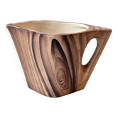 Ceramic jug imitating wood