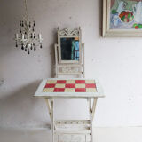 Small antique folding wooden dressing table with tiles and a mercury mirror.