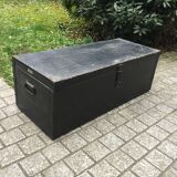 Old chest or wooden trunk black patina