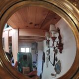 Sun mirror and witch's eye in gilded wood