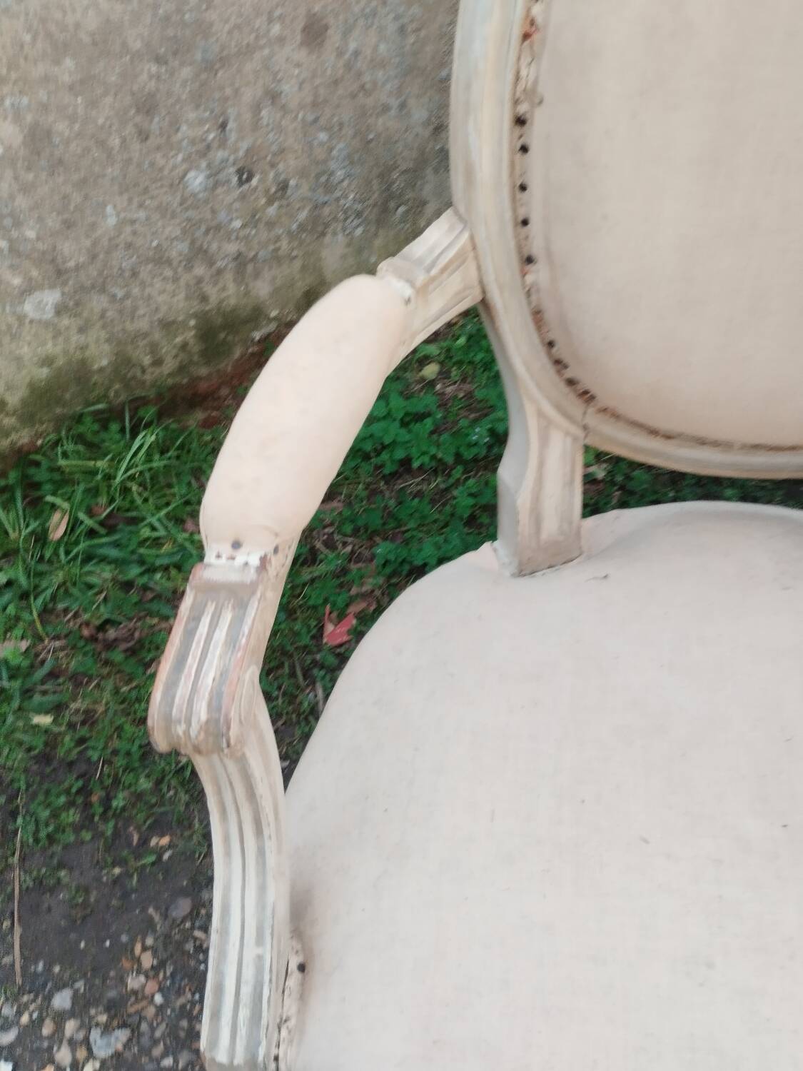 Antique armchair in Louis XVI style from the late 19th century.