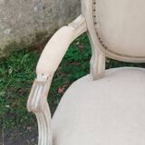 Antique armchair in Louis XVI style from the late 19th century.