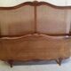 Wooden bed with canna bottom