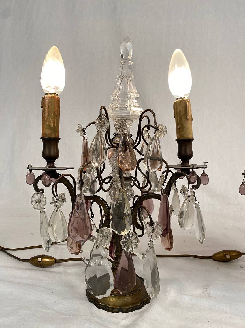Pair of bronze chandeliers with tassels