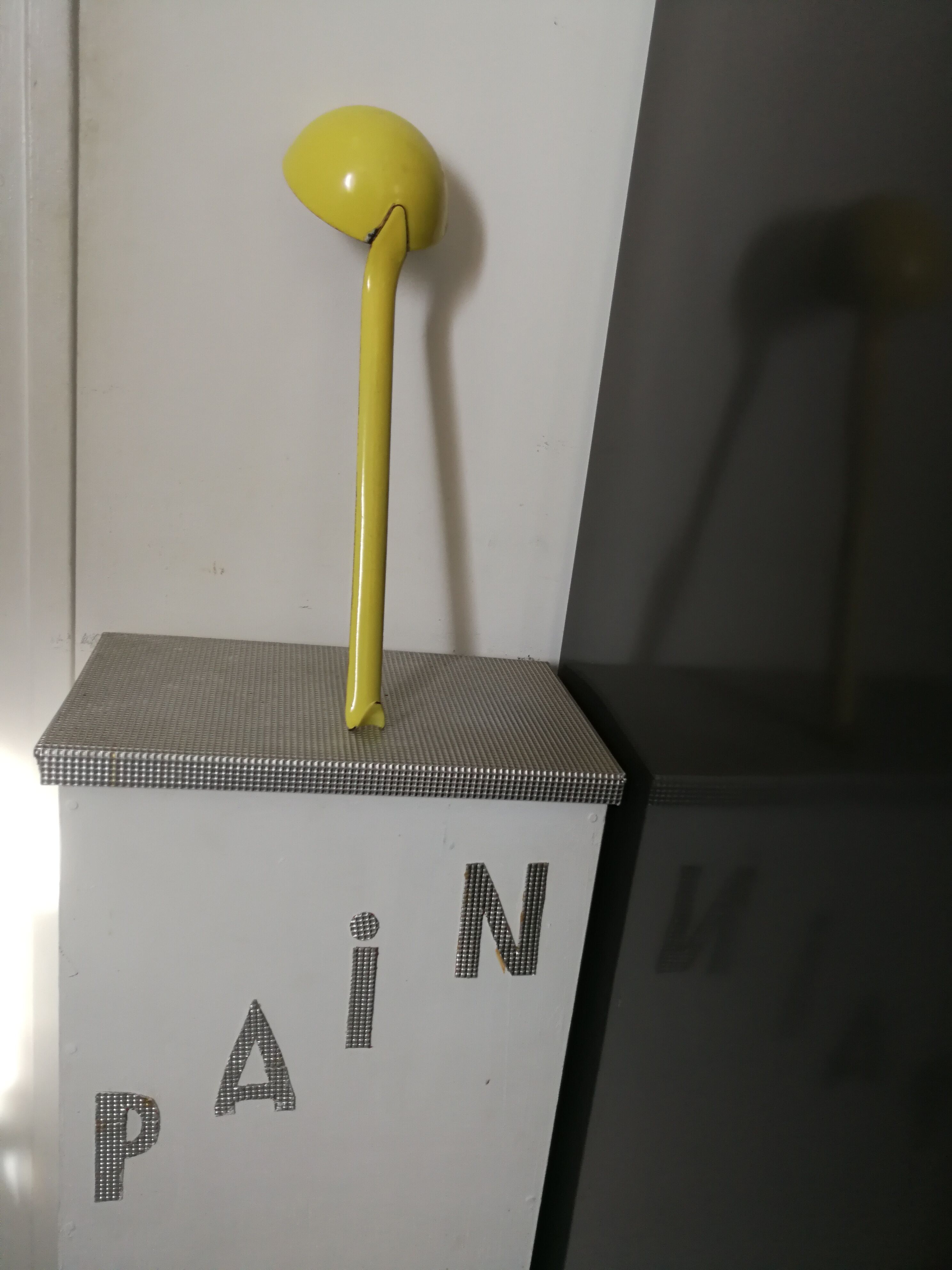 Vintage yellow enamelled ladle