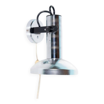 Chrome mural spot from the space age of the sixties.