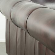 Set of a smooth chesterfield sofa and armchair with a timeless English look