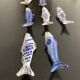 7 fish-shaped porcelain knife holders