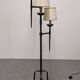 Brutalist tripod floor lamp with 3 lights in wrought iron, France circa 1950.