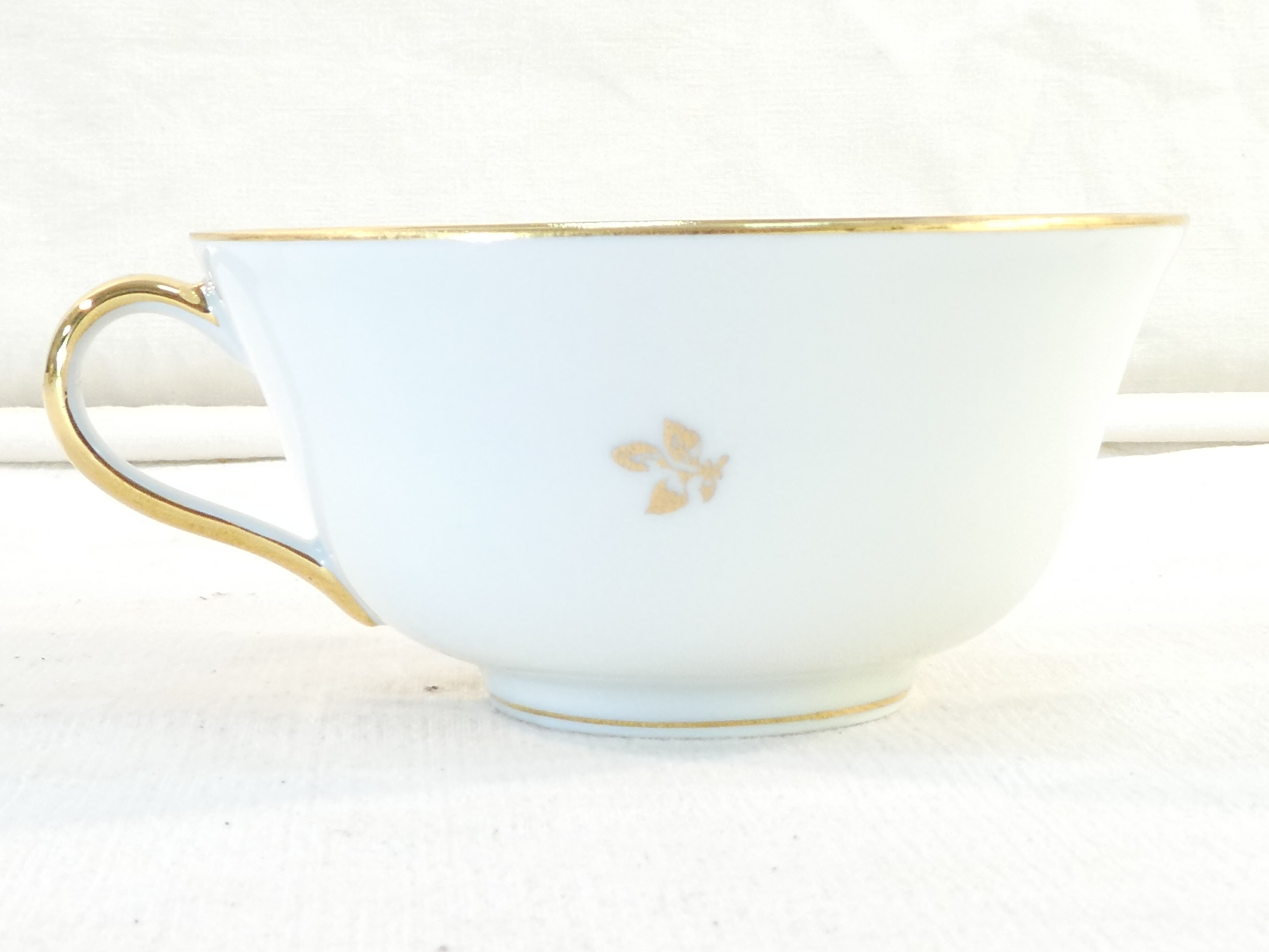 Pair of lunch cup and subcup in porcelain limoges red headband