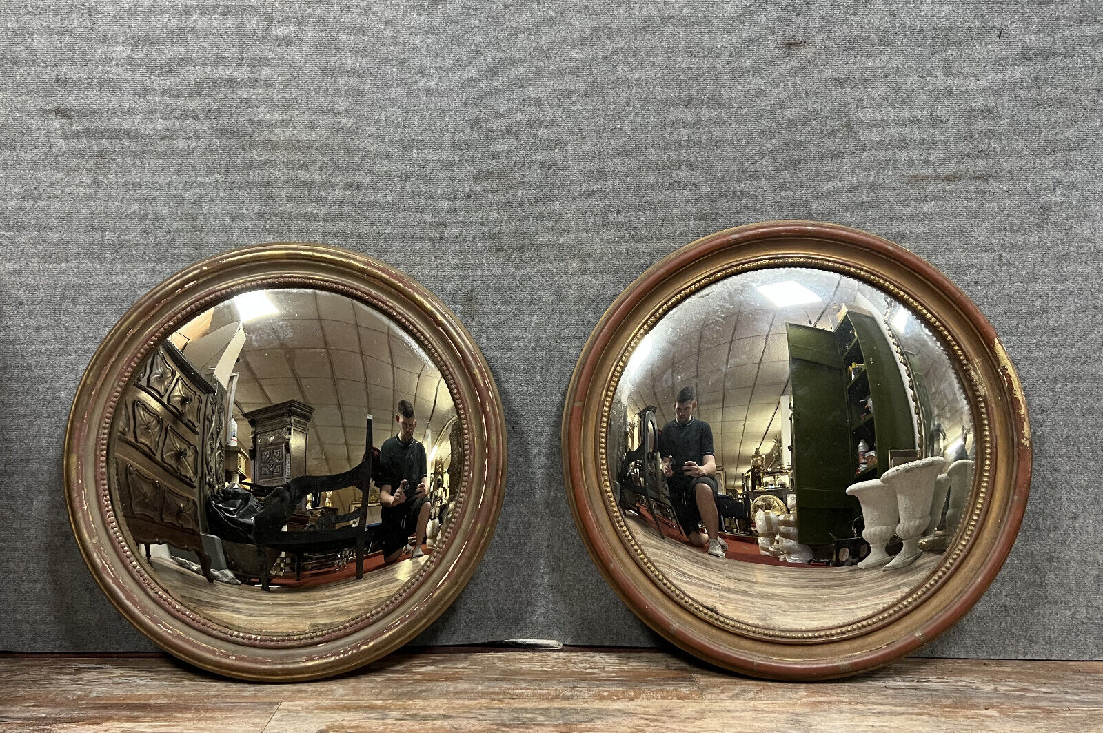 Pair of mirrors called "witch's eye" with patinated golden frame style Napoleon III