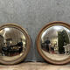 Pair of mirrors called "witch's eye" with patinated golden frame style Napoleon III