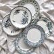 6 mismatched Saint Amand ironware dessert plates
