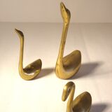 Trio of brass swans