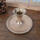 Brass candlestick with a ribbed dish
