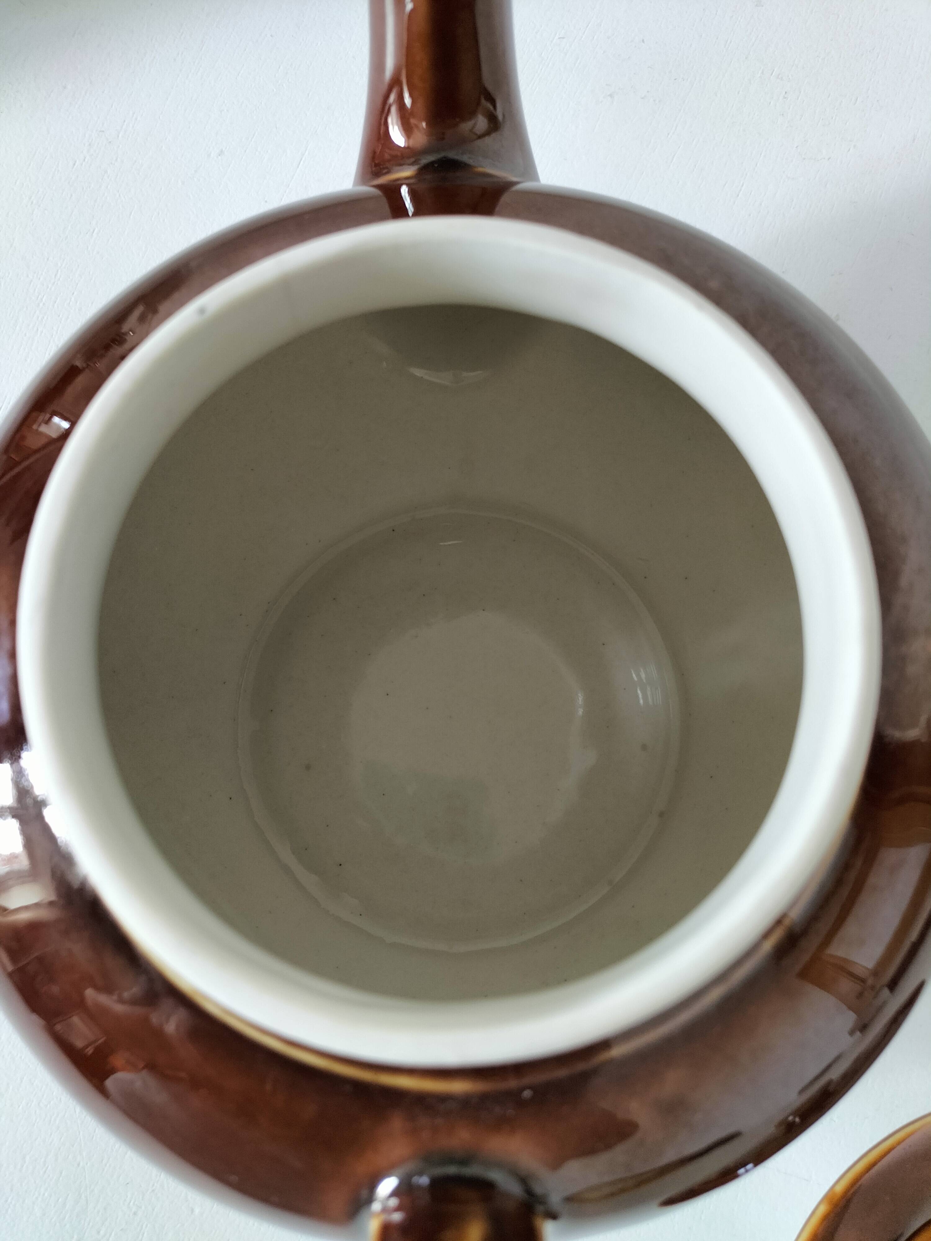 Vintage brown glazed earthenware teapot, mid-century sculptural decor.