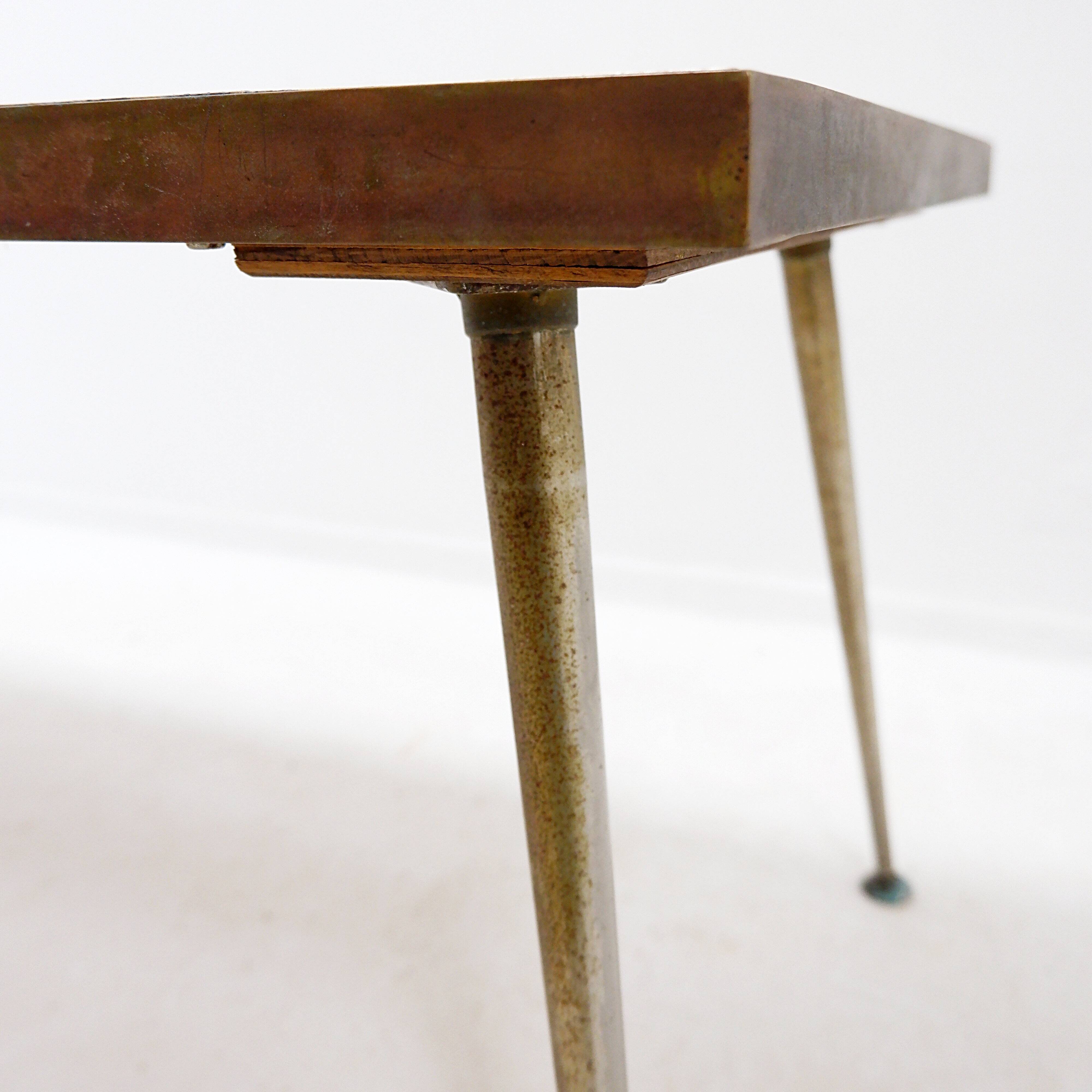 Coffee table with ceramics by Charles Emile Pinson, circa 1958.