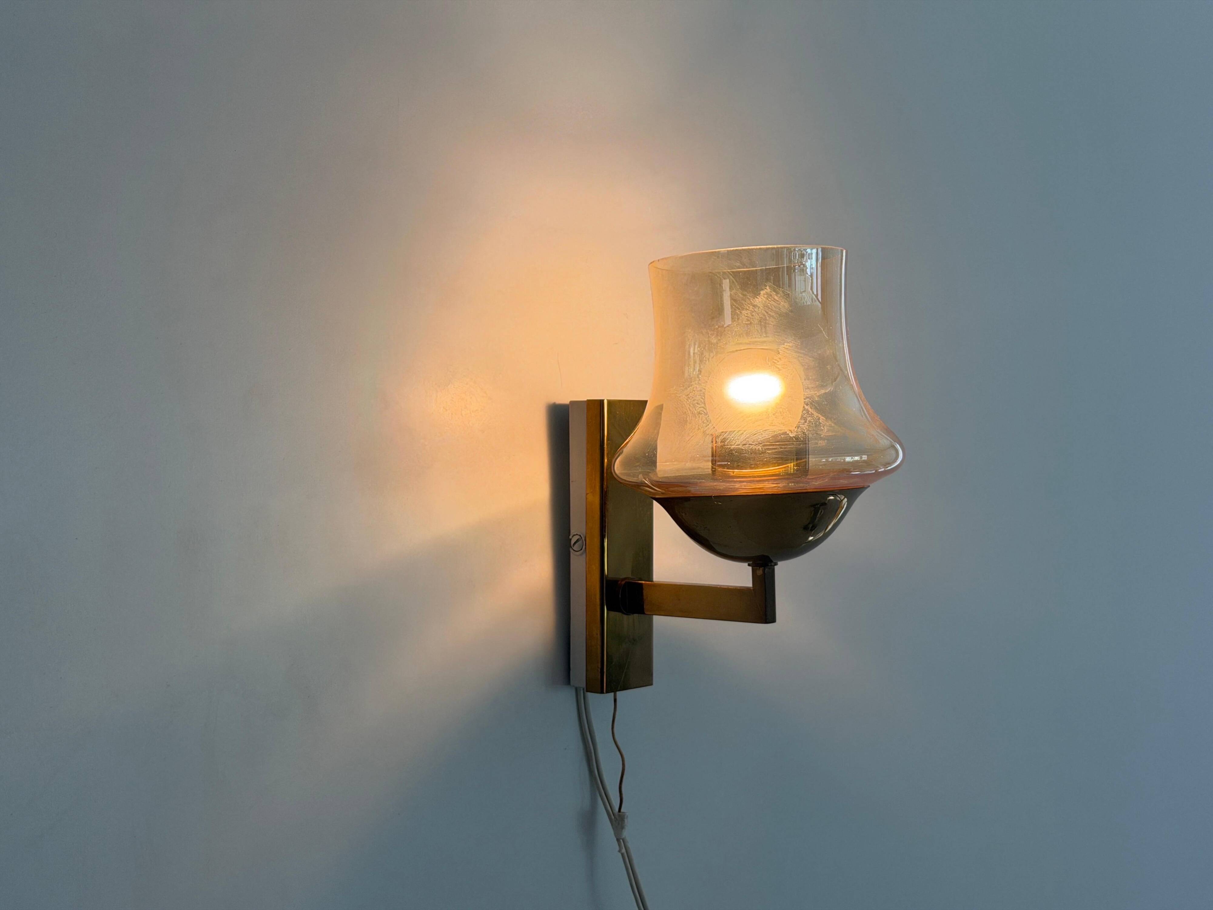 Yellow glass and brass wall light from the mid-century, 1960, Germany.