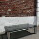 Vintage coffee table with smoked glass and chrome.