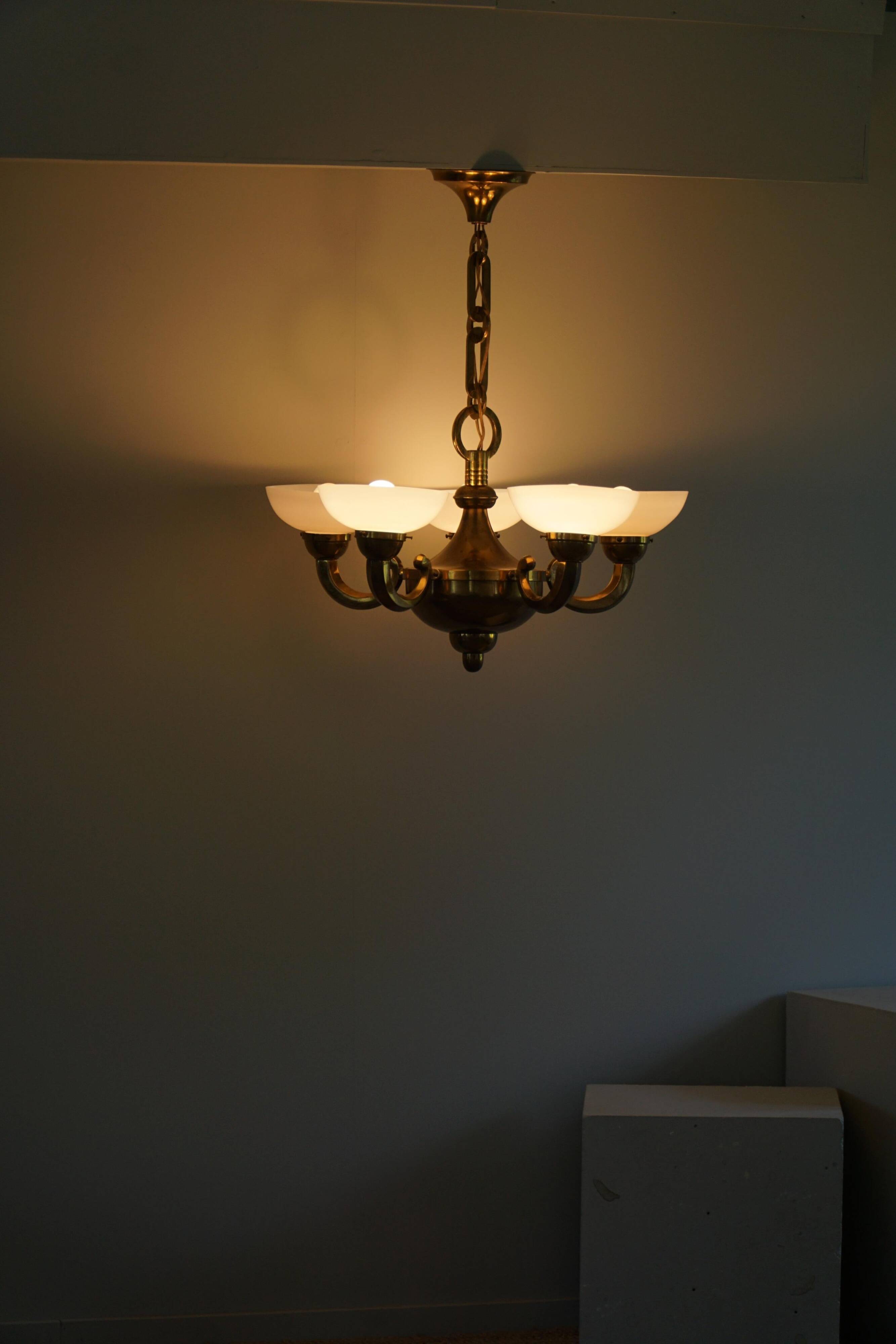 A modern Danish Art Deco chandelier, glass and brass, 1940s.