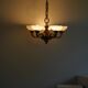 A modern Danish Art Deco chandelier, glass and brass, 1940s.