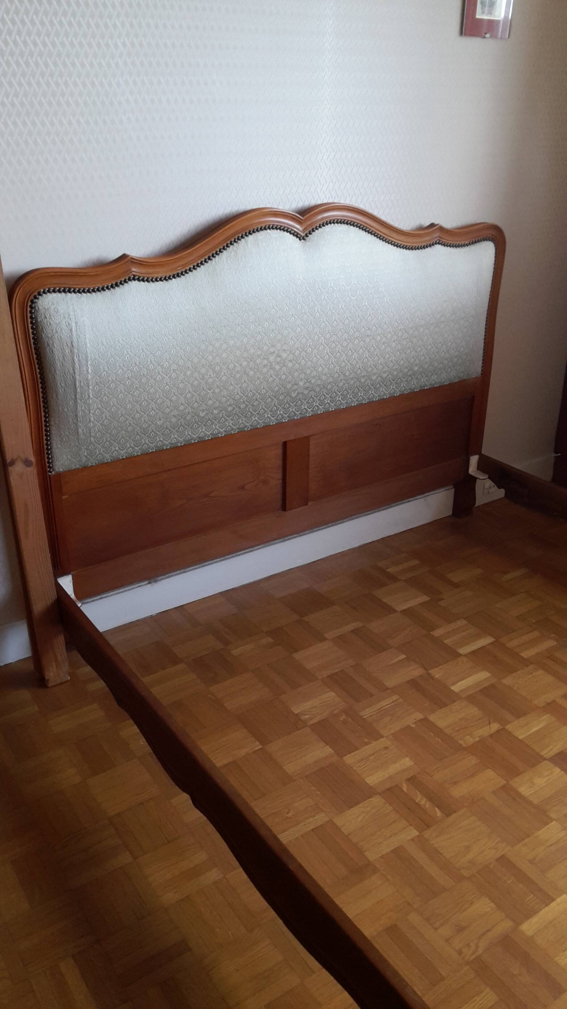 Cabinetmaker's bed frame and matching upholstered bedspread