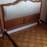 Cabinetmaker's bed frame and matching upholstered bedspread