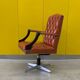Vintage orange leather buttoned back gainsborough swivel desk chair from 1980