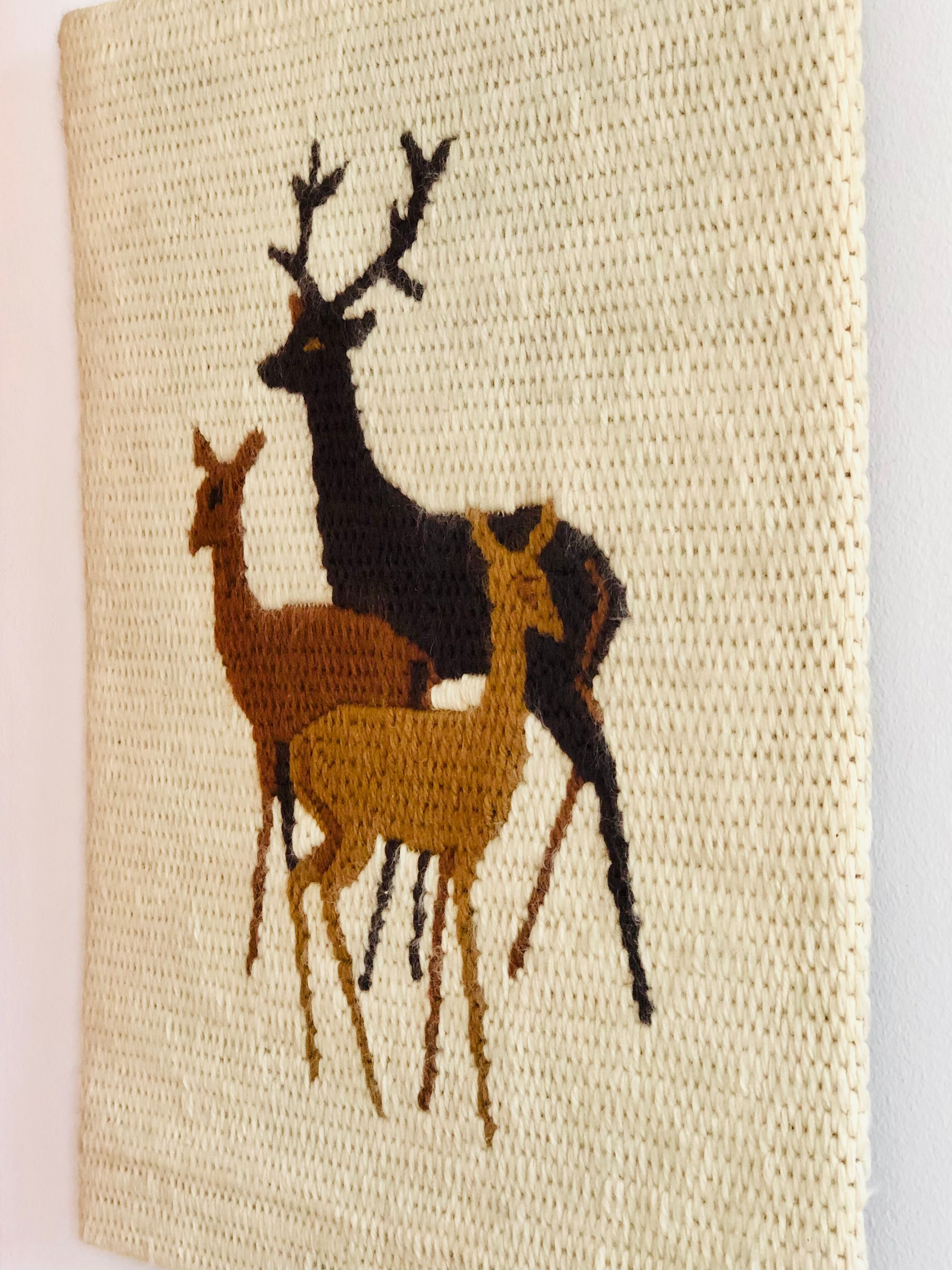 Vintage wool weaving deer family