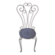 Chaise en métal coudé