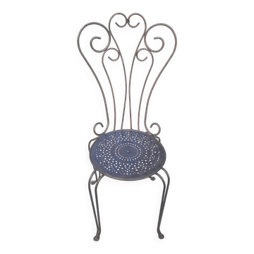 Bent metal chair