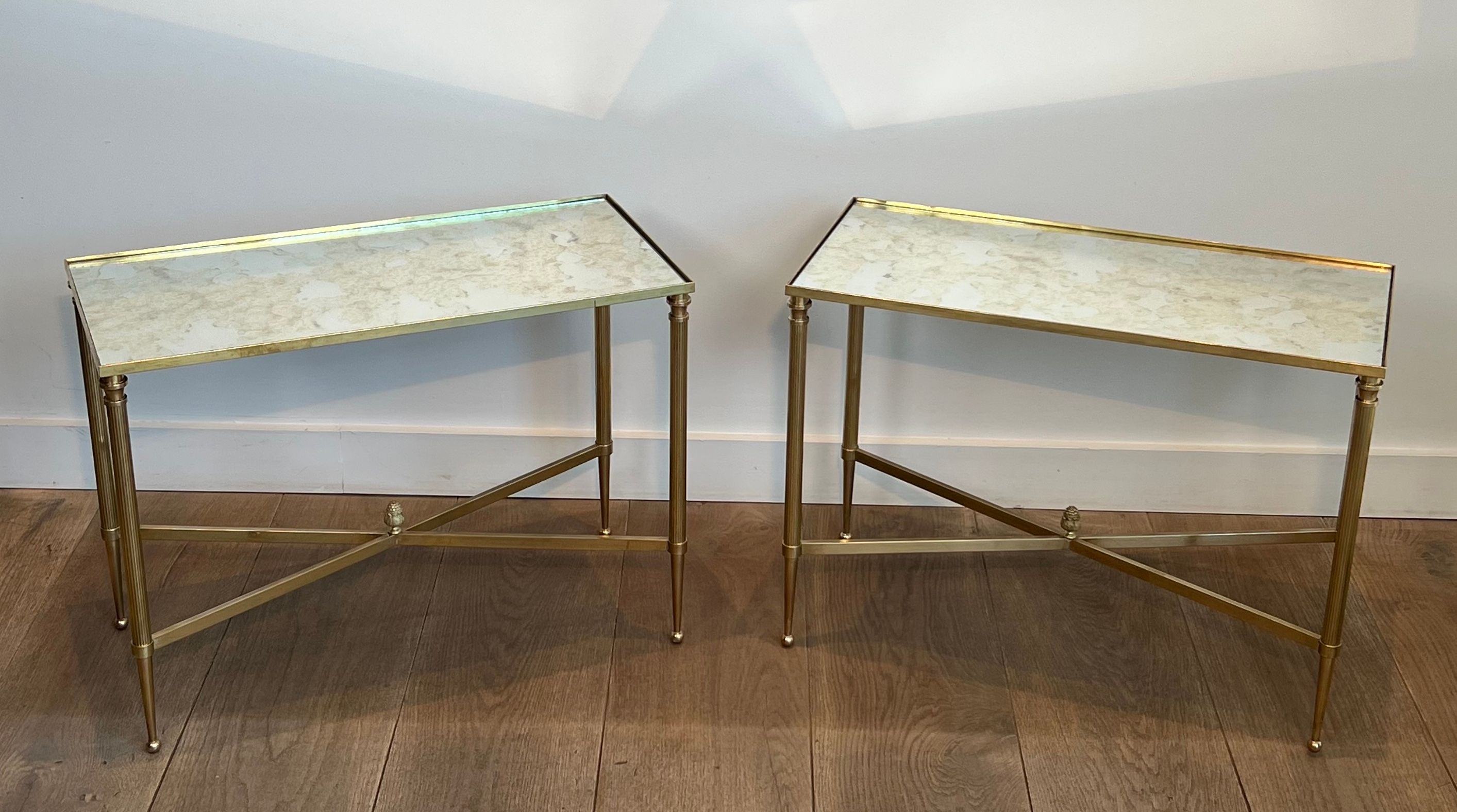 Pair of brass side tables with antique mirrored tops from Maison Jansen