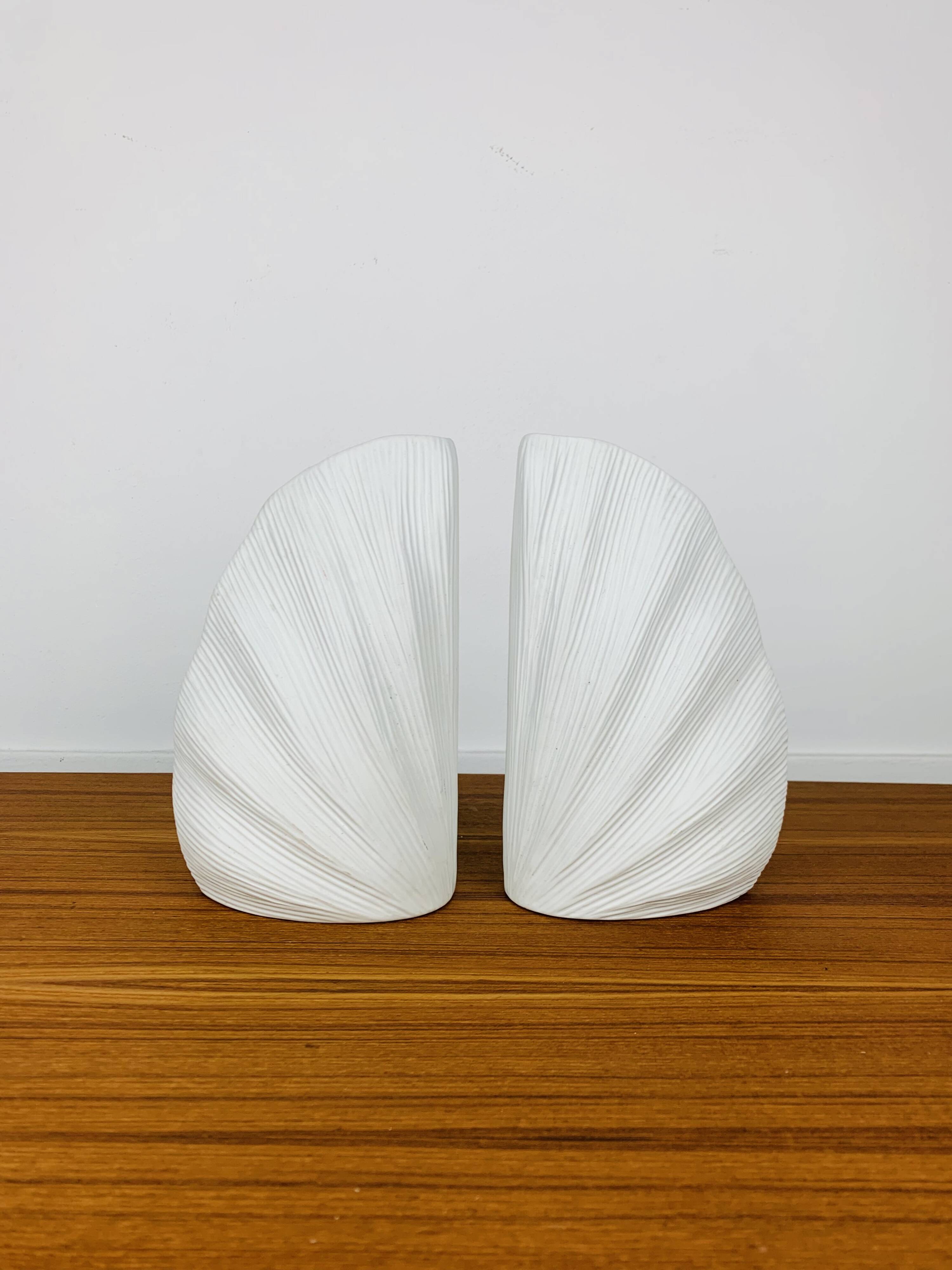 Pair of white ceramic coral vases, bookends