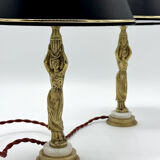 Paire de lampes dorées porteuses d'eau