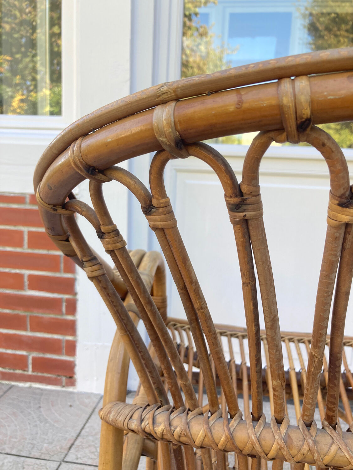 Vintage shell rattan armchair