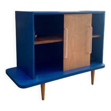 Upcycled buffet with sliding door
