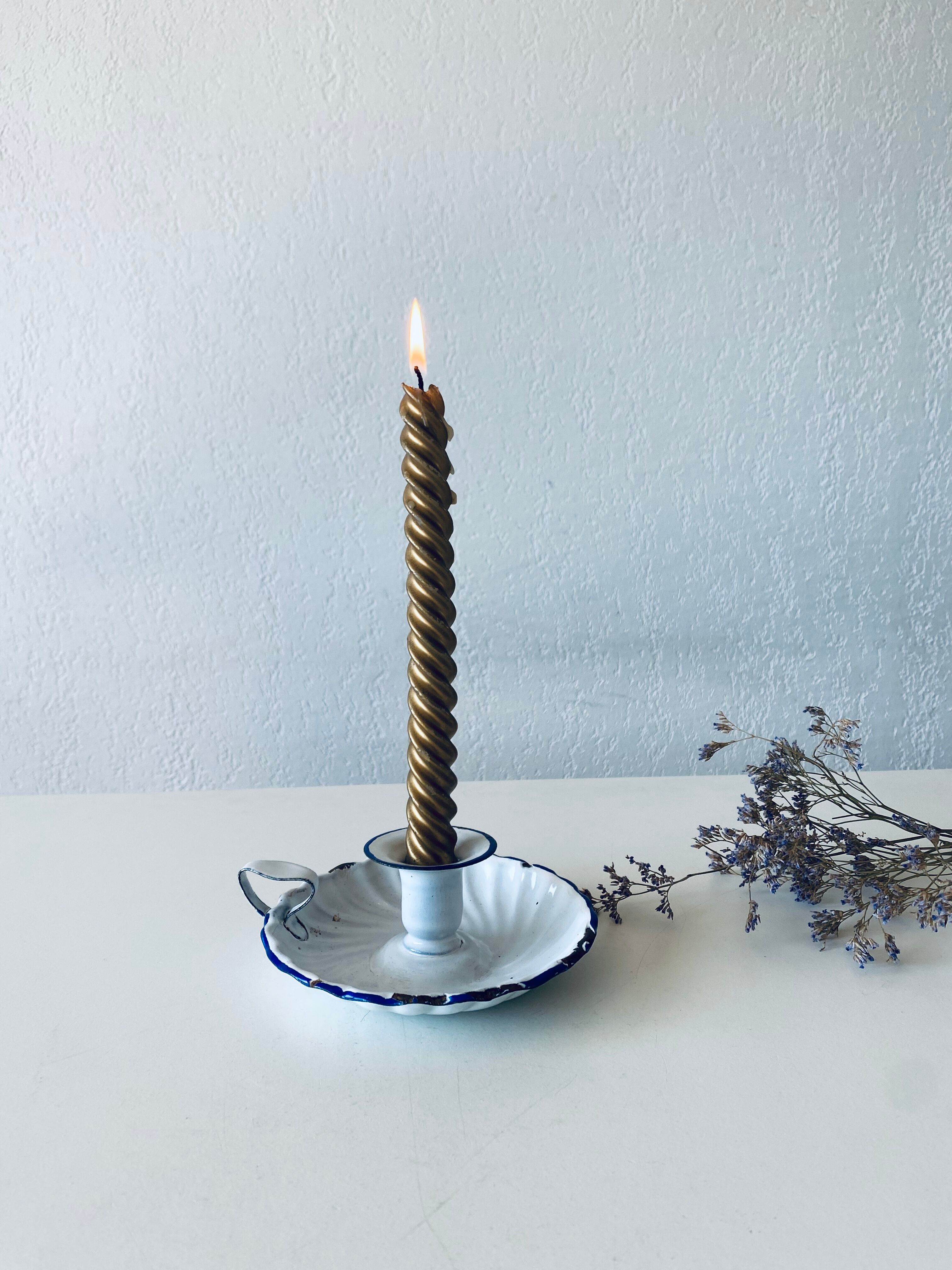 Antique candle holder in white and blue enamelled metal