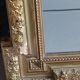 Antique mirror in wood and gilded stucco, neo Louis XVI style.