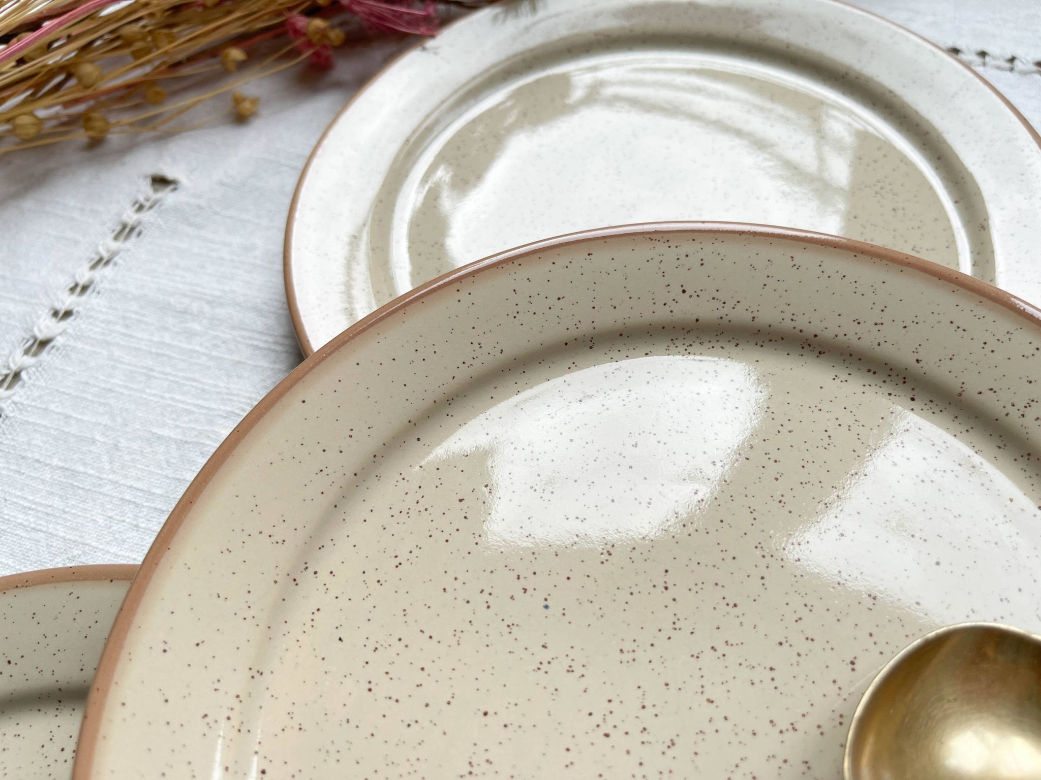 4 Small plates in speckled stoneware, Tulowice style, mid-century, 20th century