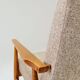 Fauteuil scandinave en tissu tressé beige