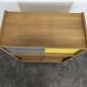 Modernist sideboard with glass doors in grey and yellow oak veneer.